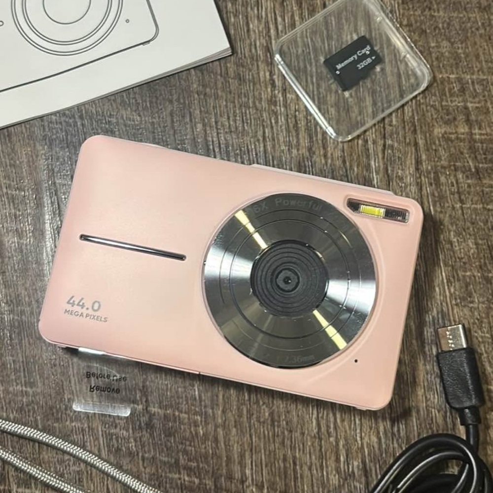 Pink Digital Camera with Accessories